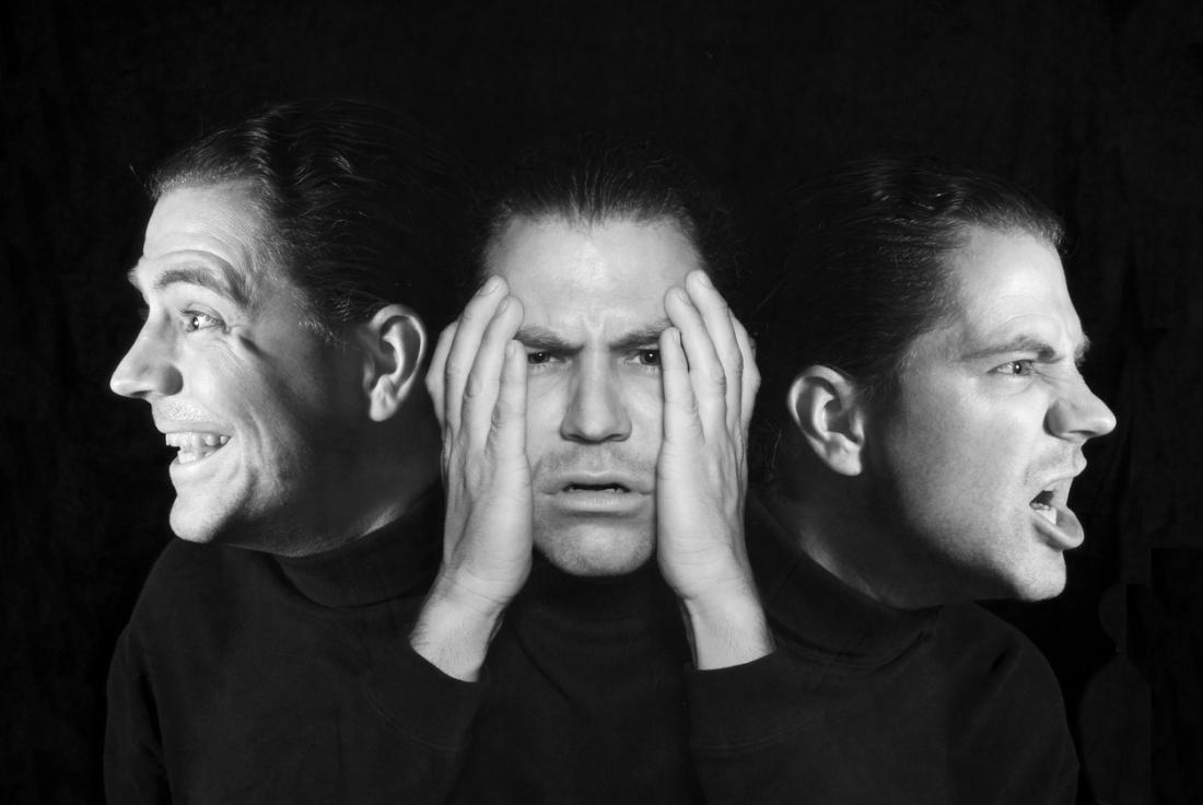 A picture of the same man in a black shirt making three different expressions.