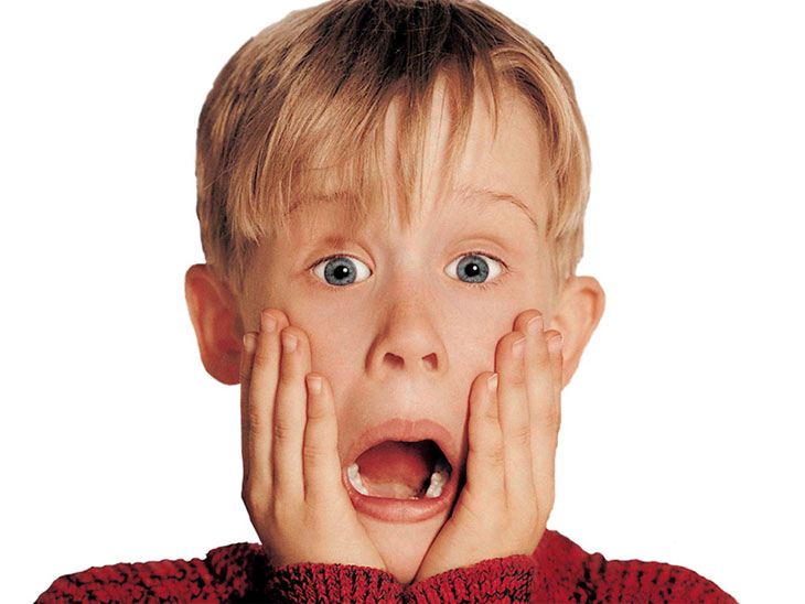 Image of actor Macaulay Culkin playing Kevin McCallister from Home Alone with his hands on his face and his mouth open, as if screaming