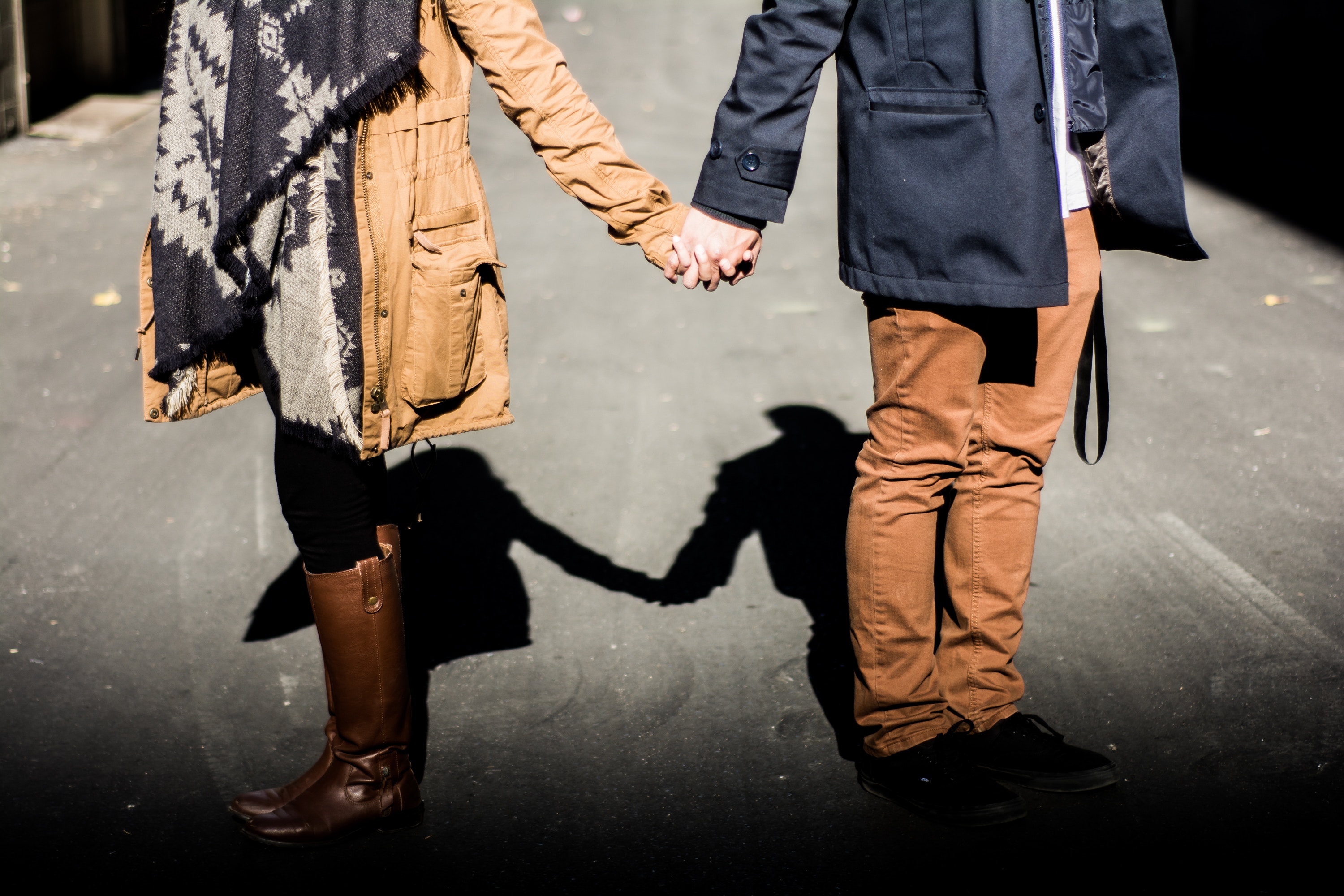 Couple walking and holding hands